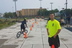 Kids participating in a safety obstacle course.