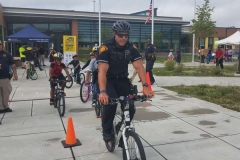Bridgeport Police Officer leading a safety obstacle course.